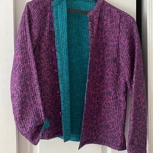 Great jacket silk like can wear both ways purple or teal sides size med or 10